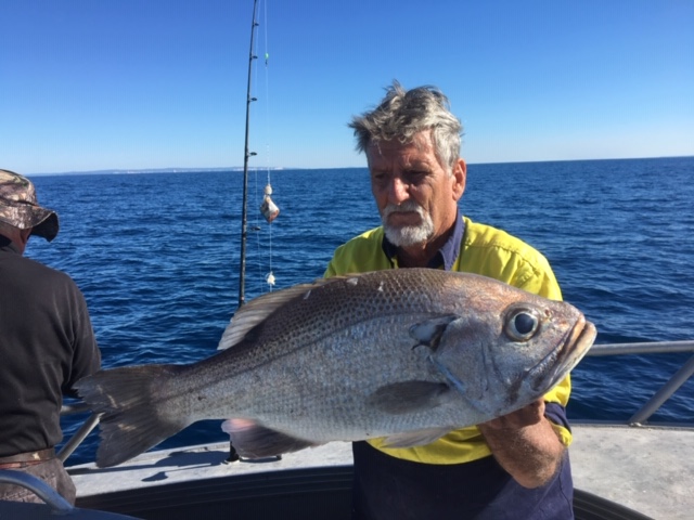 Member of the Tin Can Bay Fishing Club on the Keely Rose Fishing Charter 